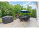 Spacious deck with outdoor dining area, grill, and views of a lush backyard at 1801 Oatlands Ct, Wake Forest, NC 27587