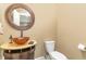 Stylish powder room with unique vessel sink and modern fixtures at 1801 Oatlands Ct, Wake Forest, NC 27587