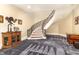 Grand staircase with custom ironwork railing ascends from a large foyer with elegant carpeting and decorative accents at 1801 Oatlands Ct, Wake Forest, NC 27587