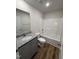 Modern bathroom with granite countertops, tile floors, and a shower-tub combination at 181 Tulipfield Way, Benson, NC 27504