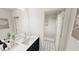 Sleek bathroom featuring modern sink, decorative tile, and glass-enclosed shower at 1903 Plott Balsam Dr, Wendell, NC 27591