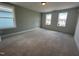Bedroom featuring neutral carpet, natural light, and ample space for furnishings at 1903 Plott Balsam Dr, Wendell, NC 27591
