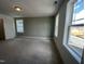 A cozy bedroom with soft carpet, natural light, and views of the community at 1903 Plott Balsam Dr, Wendell, NC 27591