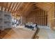 Unfinished attic with exposed wood framing and insulation, showing the potential for future expansion at 193 Jenny Ln, Timberlake, NC 27583