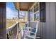 Relaxing front porch with rocking chairs to watch the world go by at 193 Jenny Ln, Timberlake, NC 27583