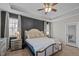 Relaxing bedroom with a cozy bed, bedside tables, soft lighting, and dark accent wall at 193 Jenny Ln, Timberlake, NC 27583