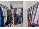 Organized walk-in closet with shelving and hanging rods, providing ample storage space for clothing and shoes at 193 Jenny Ln, Timberlake, NC 27583