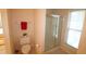 Cozy bathroom with a toilet, shower, and modern fixtures at 2520 Friedland # 202, Raleigh, NC 27617