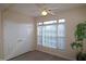 Bedroom with a ceiling fan, closet, and large windows at 2520 Friedland # 202, Raleigh, NC 27617