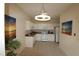 A kitchen with granite countertops and white appliances at 2520 Friedland # 202, Raleigh, NC 27617