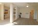 Bright living room with fireplace, open floor plan, and neutral color palette at 2520 Friedland # 202, Raleigh, NC 27617