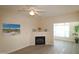 Bright living room featuring a fireplace, neutral walls and light wood flooring at 2520 Friedland # 202, Raleigh, NC 27617