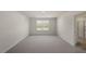 Spacious, light-filled bedroom with neutral carpeting and an en-suite bathroom at 2562 Summersby Dr, Mebane, NC 27302