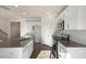 Open kitchen showcases granite counters, modern appliances, and stylish white cabinets at 2562 Summersby Dr, Mebane, NC 27302