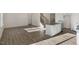 Open floor plan with new hardwood floors, connecting the living room and kitchen at 2562 Summersby Dr, Mebane, NC 27302