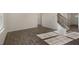 Spacious open living area featuring beautiful hardwood floors and a staircase to the second floor at 2562 Summersby Dr, Mebane, NC 27302