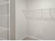 An organized walk-in closet with wire shelving, providing ample storage space at 2562 Summersby Dr, Mebane, NC 27302