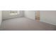 Large primary bedroom with lots of light and an ensuite bathroom at 2573 Summersby Dr, Mebane, NC 27302