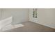 Neutral bedroom with carpet and a window bringing in light at 2573 Summersby Dr, Mebane, NC 27302