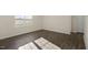 Bedroom featuring neutral carpet, freshly painted walls, and a window providing natural light at 2573 Summersby Dr, Mebane, NC 27302