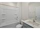 Bathroom featuring a shower-tub combination, white toilet, and gray vanity at 2735 Luxborough Ln, Mebane, NC 27302
