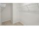 Spacious walk-in closet with carpet floors and metal shelving at 2735 Luxborough Ln, Mebane, NC 27302