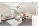 Comfortable bedroom featuring a ceiling fan, gray carpeting, and a charming vanity at 32 Colson Dr, Garner, NC 27529