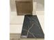 Selection of interior finish materials including cabinet, countertop, backsplash, and floor tile at 320 White Oak Garden Way # 218, Garner, NC 27529