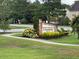 East Clayton Community Park sign with flowers and manicured landscaping at 378 Oak Alley Trl, Clayton, NC 27527