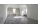 Bright bedroom featuring custom built-in shelving and sitting benches at 3913 Berkeley Town Ln, Fuquay Varina, NC 27526