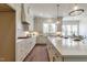 Gourmet kitchen with marble countertops, stainless appliances, and ample cabinet space at 3913 Berkeley Town Ln, Fuquay Varina, NC 27526