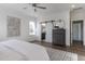 Bright main bedroom with ensuite bathroom and modern decor at 3913 Berkeley Town Ln, Fuquay Varina, NC 27526