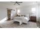 Cozy main bedroom featuring neutral tones and comfortable bedding at 3913 Berkeley Town Ln, Fuquay Varina, NC 27526