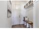 Functional mudroom with bench, storage, and decor for entryway organization at 3913 Berkeley Town Ln, Fuquay Varina, NC 27526