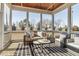 Relaxing screened porch with comfortable seating and outdoor views at 3913 Berkeley Town Ln, Fuquay Varina, NC 27526