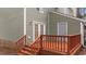 Backyard deck area with stairs and wooden railing at 402 Shannonford Ct, Wake Forest, NC 27587