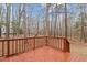 Back deck with surrounding woods at 402 Shannonford Ct, Wake Forest, NC 27587