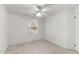 Clean bedroom with neutral walls, carpet, and a ceiling fan with lighting at 402 Shannonford Ct, Wake Forest, NC 27587