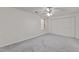 Spacious bedroom with a ceiling fan, neutral walls, carpet, and a closet at 402 Shannonford Ct, Wake Forest, NC 27587
