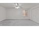 Large bedroom featuring neutral walls, carpet, a window, and closet doors at 402 Shannonford Ct, Wake Forest, NC 27587