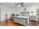 Spacious bedroom with bed, desk and dresser at 4052 Dunkirk Dr, Burlington, NC 27215
