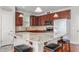Kitchen featuring granite counters, custom cabinets, tile backsplash, and center island at 4052 Dunkirk Dr, Burlington, NC 27215