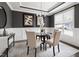 Dining room features a coffered ceiling, neutral walls, and a view of the outdoors at 428 Boulder Point Dr, Chapel Hill, NC 27516