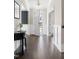 Elegant foyer with dark wood floors and decorative wainscoting at 428 Boulder Point Dr, Chapel Hill, NC 27516