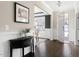 Bright foyer featuring hardwood floors and a view into the dining room at 428 Boulder Point Dr, Chapel Hill, NC 27516