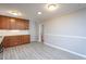 This eat-in kitchen has shaker cabinets, granite countertops, and a subway tile backsplash at 513 Princeton St, Raleigh, NC 27609