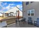 Backyard with a wooden deck, dining table, and seating area at 525 Marion Hills Way, Knightdale, NC 27545