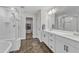 Bright bathroom with double vanity, glass shower, and modern fixtures at 525 Marion Hills Way, Knightdale, NC 27545