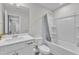 Bathroom with white cabinets and a tub and shower combo at 525 Marion Hills Way, Knightdale, NC 27545