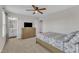 Bedroom with light-colored walls, neutral carpet, and a wood dresser at 525 Marion Hills Way, Knightdale, NC 27545
